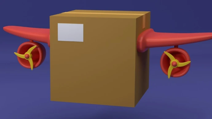 a cardboard box with a red propeller on it